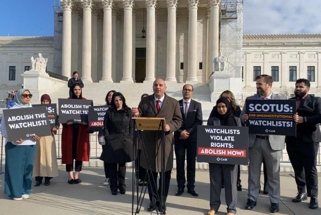 Gadeir Abbas speaking in front of the steps of the US Supreme Court